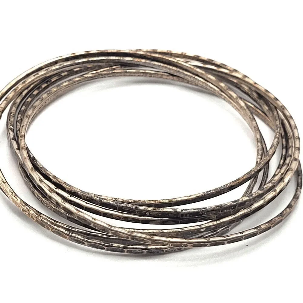 Interlocked Set of 7 Silver Bangle Bracelets 2.6in dia